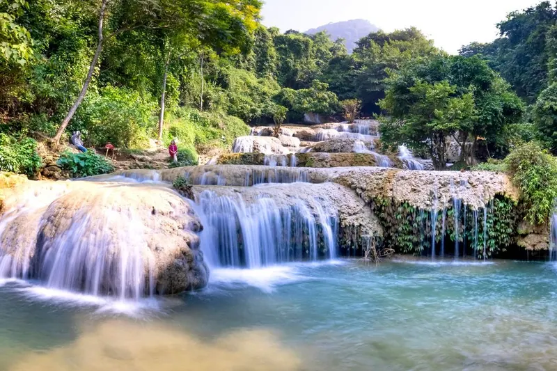 Turquoise pools on a limestone waterfall