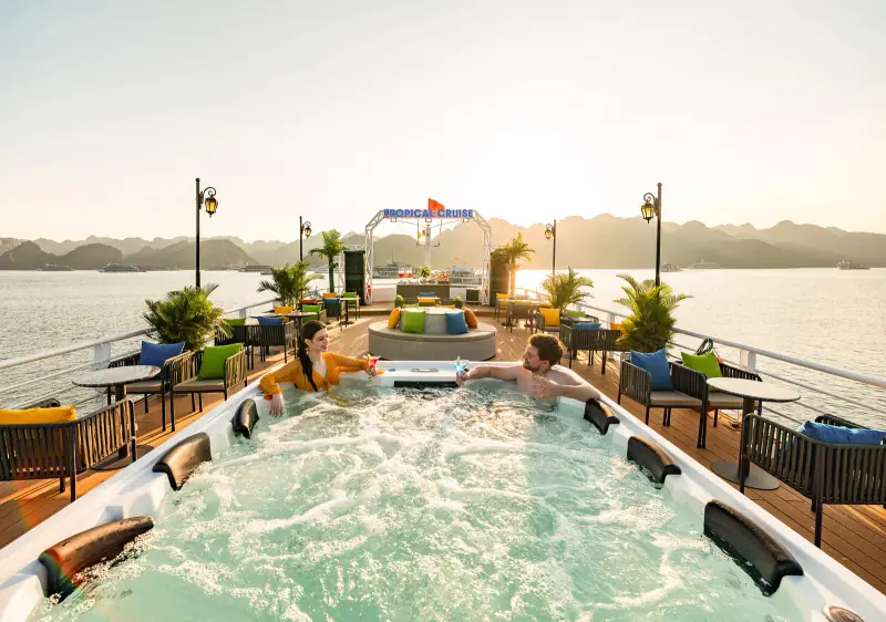 Two travellers in a sundeck jacuzzi on Ha Long Bay