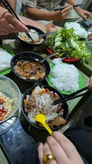 Diamond guiding a Hanoi street food tour